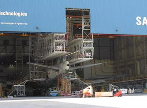 探秘飞机制造厂 超大物流设备与公路国际货运代理的协同作业